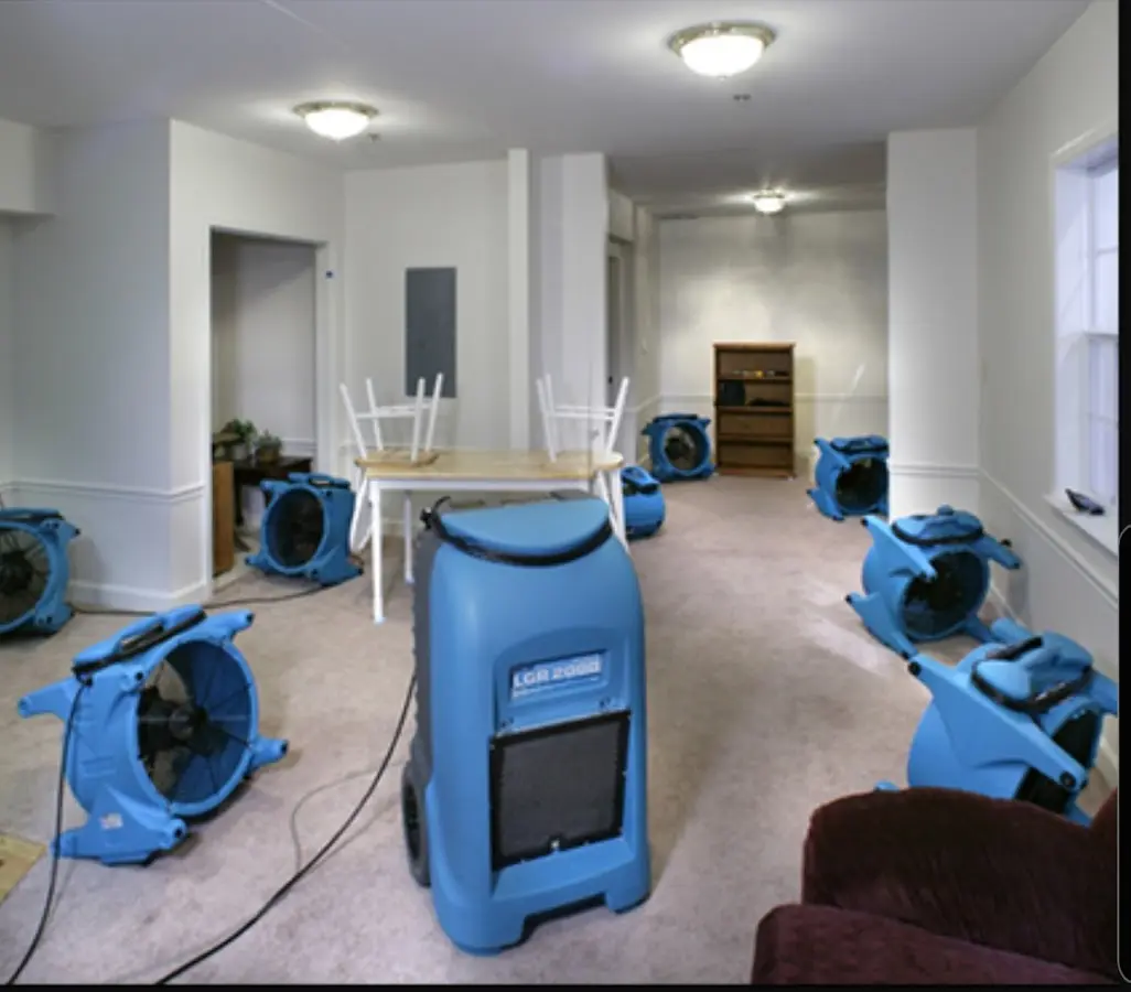 Air movers and dehumidifier setup for Water Damage Restoration in Oceola